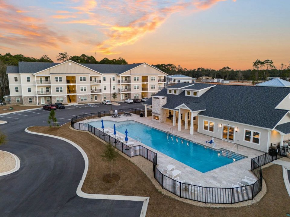 Pool house and apartment complex aerial