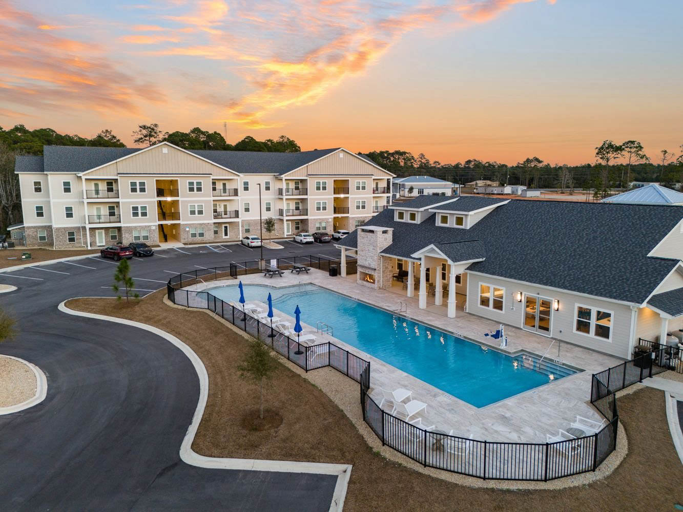 Pool house and apartment complex aerial
